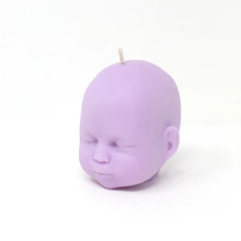 Load image into Gallery viewer, lilac/light purple doll head shaped candle on white background