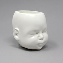 Load image into Gallery viewer, Doll head pot in matte white shown on grey background, the eyes are closed and looks like a sleeping doll