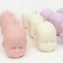 Load image into Gallery viewer, group image showing different colours of doll head candles available, pink, white, purple grey
