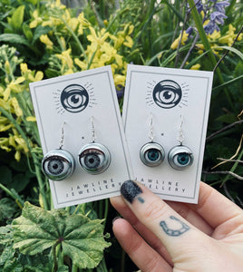 doll eye earrings, showing the large grey eyes, and the small vintage style eyes also available in blue